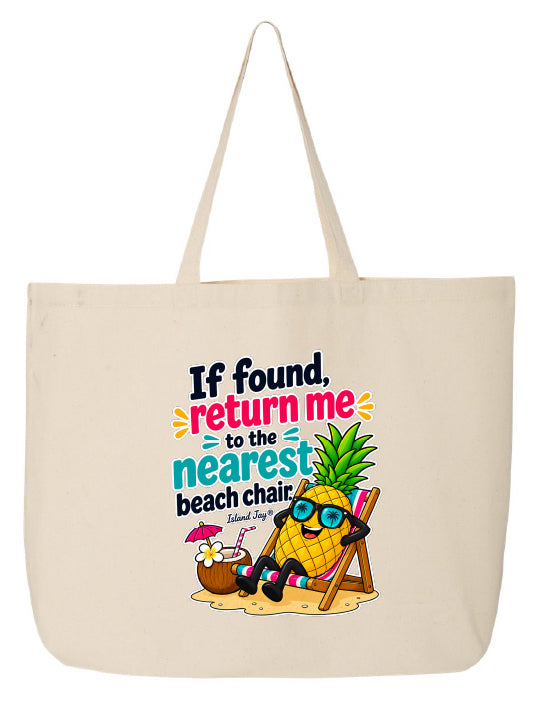 A beige canvas tote bag with long handles, featuring a colorful graphic print of a pineapple character wearing sunglasses and a beach chair with the text 'If found, return me to the nearest beach chair.' and 'Island Style!'.