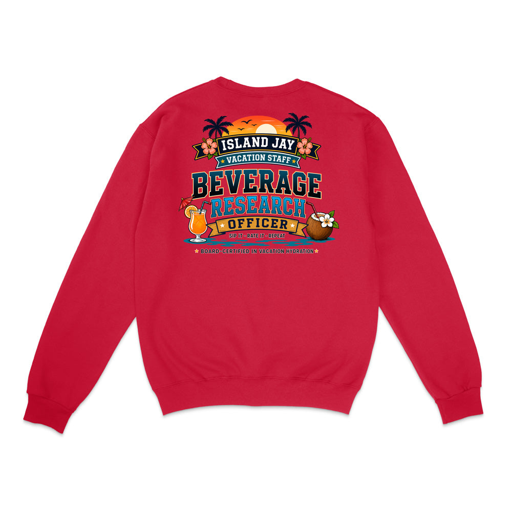 A red crewneck sweatshirt shown from the back, featuring a colorful graphic print with the text 'ISLAND JAY VACATION STAFF BEVERAGE RESEARCH OFFICER' and tropical illustrations including palm trees, flowers, a cocktail, and a coconut shell on a white background.
