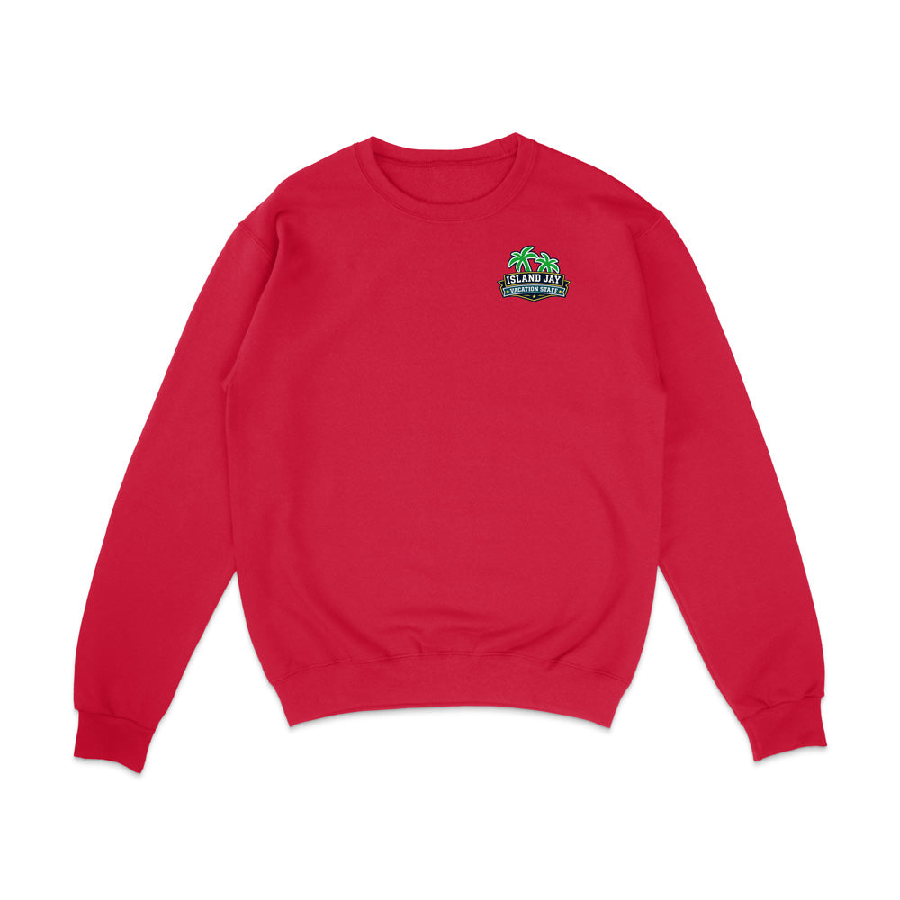 A red crewneck sweatshirt with a small green and blue graphic on the left chest featuring palm trees and the text 'SABRE DE LA GUERRA', displayed on a clean white background.