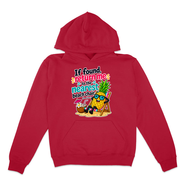 A red pullover hoodie with a colorful graphic on the chest featuring a pineapple character wearing sunglasses and a beach chair next to a coconut drink, with the text 'If found return me to the nearest beach chair'.