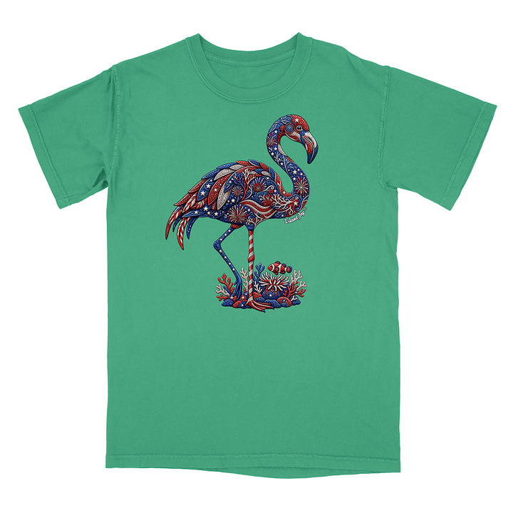 Green t-shirt with a colorful flamingo design on a white background