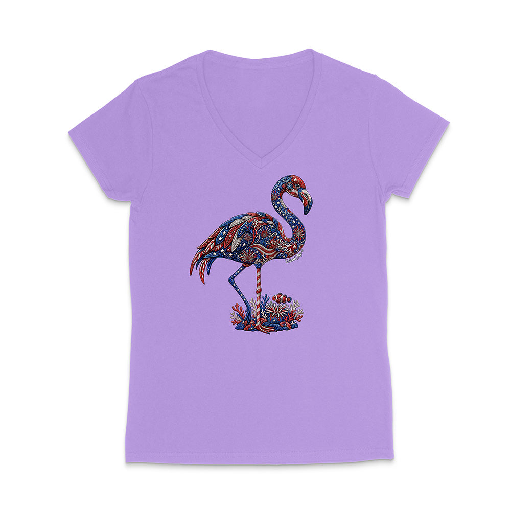 Purple t-shirt with a colorful flamingo design on a white background