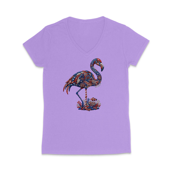 Purple t-shirt with a colorful flamingo design on a white background