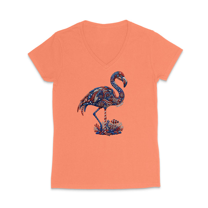 Coral t-shirt with a colorful flamingo design on a white background