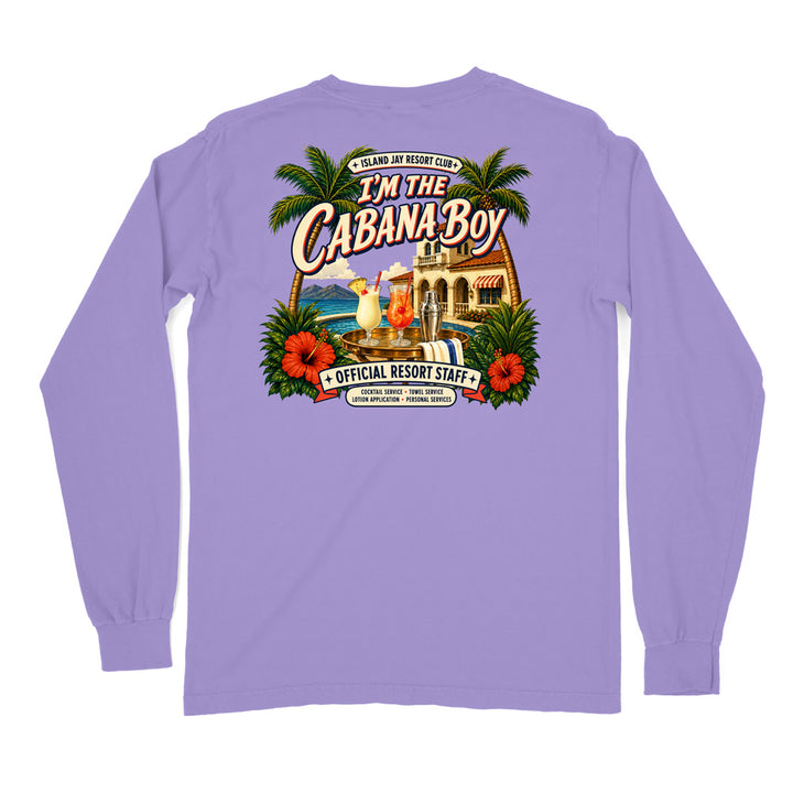 A lavender long-sleeve t-shirt shown from the back, featuring a large, colorful graphic print of a tropical resort scene with palm trees, hibiscus flowers, a cocktail, and the text 'I'M THE CABANA BOY' and 'OFFICIAL RESORT STAFF'.