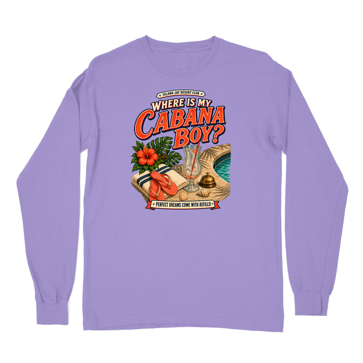 A light purple long-sleeve t-shirt with a colorful graphic print on the front. The graphic features the text 'WHERE IS MY CABANA BOY?' in red and orange lettering, accompanied by illustrations of a tropical pool, a wicker bag, a drink, and hibiscus flowers.