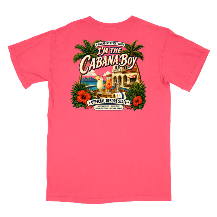 A bright pink short-sleeve t-shirt shown flat against a white background, featuring a large colorful graphic print on the front with palm trees, hibiscus flowers, a cabana, and the text 'I'm The Cabana Boy' and 'Official Resort Staff'.
