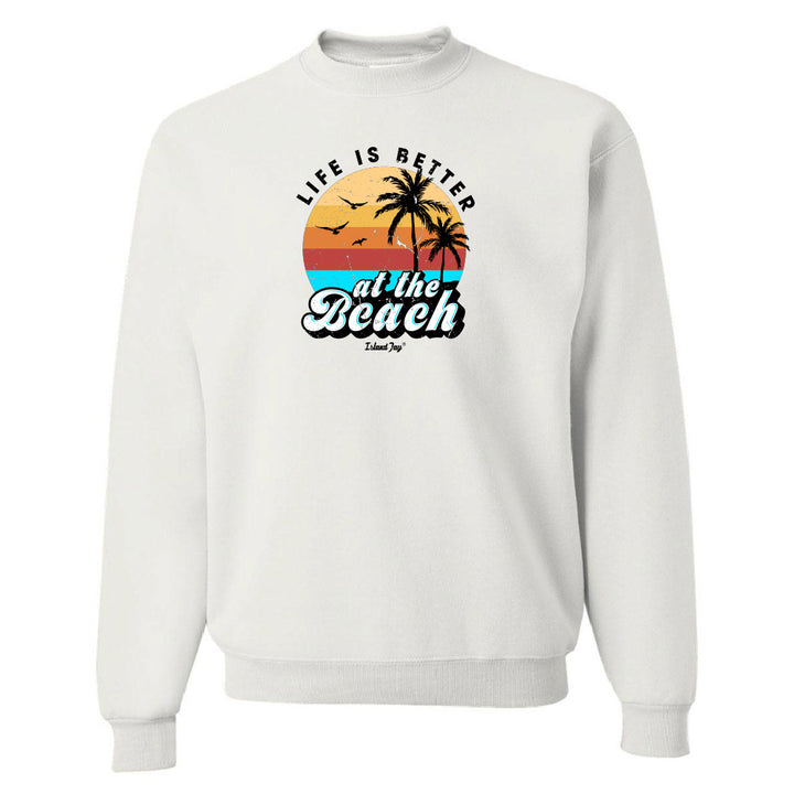 White sweatshirt with 'Life is Better at the Beach' graphic design on a white background