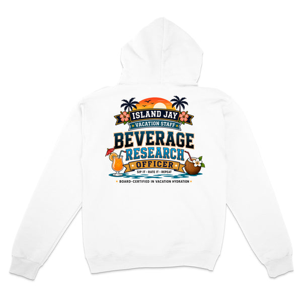 A white hooded sweatshirt shown from the back, featuring a colorful graphic print that reads 'ISLAND JAY BEVERAGE RESEARCH OFFICER' with tropical illustrations including palm trees, a coconut drink, and a yellow drink can.