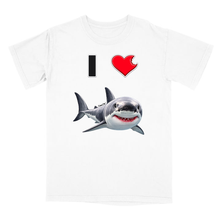 A white short-sleeve crewneck t-shirt featuring a graphic print of a great white shark below a text design that reads 'I' followed by a red heart.