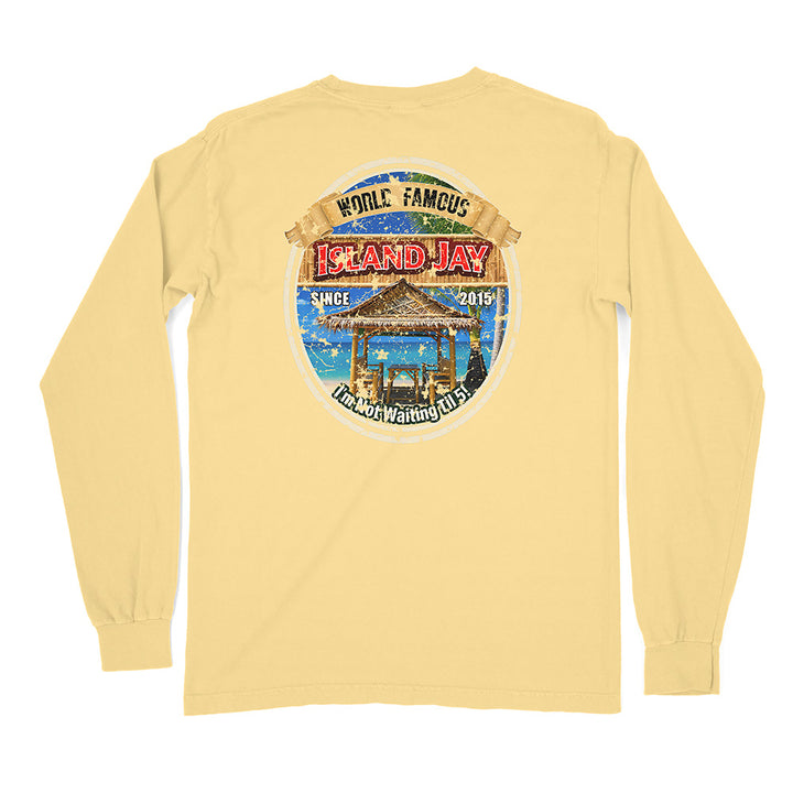 A pale yellow long-sleeve t-shirt shown from the back, featuring a large circular graphic print on the center back with a beach cabana illustration and the text 'World Famous Island Jay' and 'Dr. Who's Walking Club'.