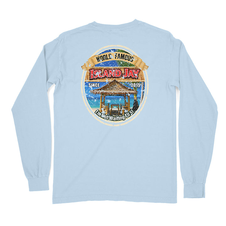 A light blue long-sleeve t-shirt shown from the back, featuring a large circular graphic print on the center back with a beach scene and the text 'World Famous Island Jay'.