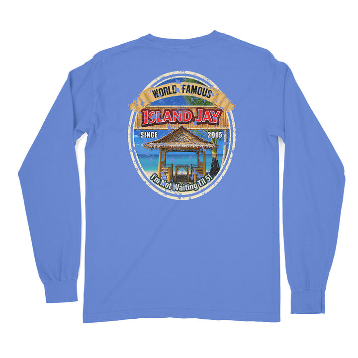 A blue long-sleeve t-shirt shown from the back, featuring a large circular graphic print on the center back with a beach scene and the text 'WORLD FAMOUS ISLAND JAY'.