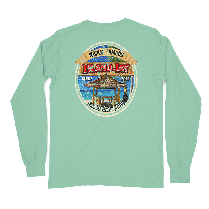 A mint green long-sleeve t-shirt shown from the back, featuring a large circular graphic print on the center back with a beach cabana, blue water, and text reading 'World Famous Island Jay' and 'I'm Not Waiting 100 Years'.