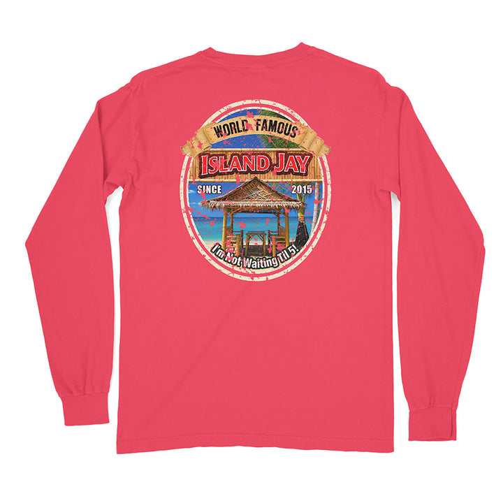 A coral pink long-sleeve t-shirt with a large circular graphic on the back. The graphic features a beach scene with a gazebo and the text 'WORLD FAMOUS ISLAND JAY SINCE 2019' and 'KAMPWAiting Island'.