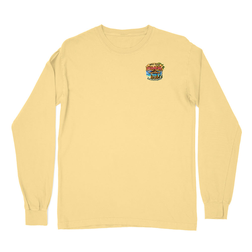 A pale yellow long-sleeve crewneck t-shirt with a small colorful graphic on the left chest, displayed on a solid white background.