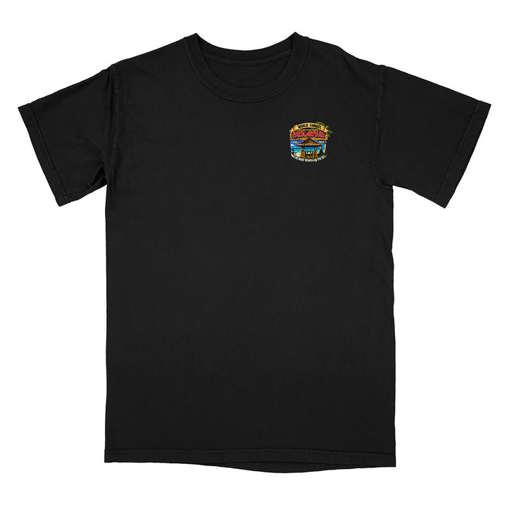 A black short-sleeve crewneck t-shirt with a small colorful graphic printed on the left chest, displayed flat against a solid white background.