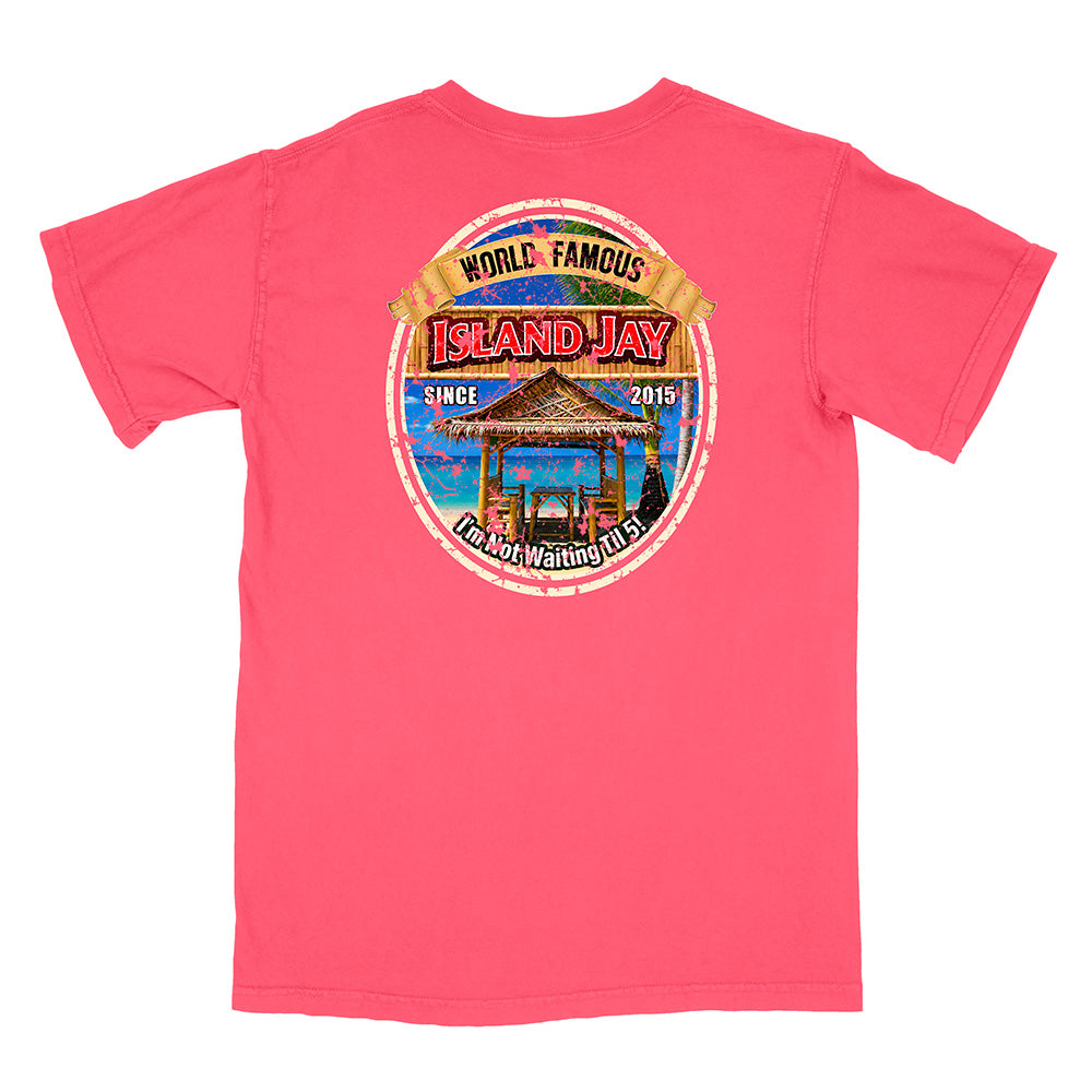 A bright pink short-sleeve t-shirt shown from the back, featuring a large circular graphic print on the center back with a tropical island scene and the text 'WORLD FAMOUS ISLAND JAY' and 'I'm Not Waiting For You'.