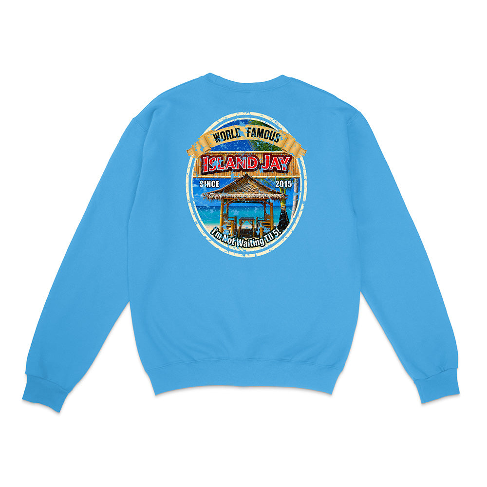 A light blue crewneck sweatshirt shown from the back, featuring a large circular graphic print with a beach bar scene and the text 'World Famous Island Jay'.