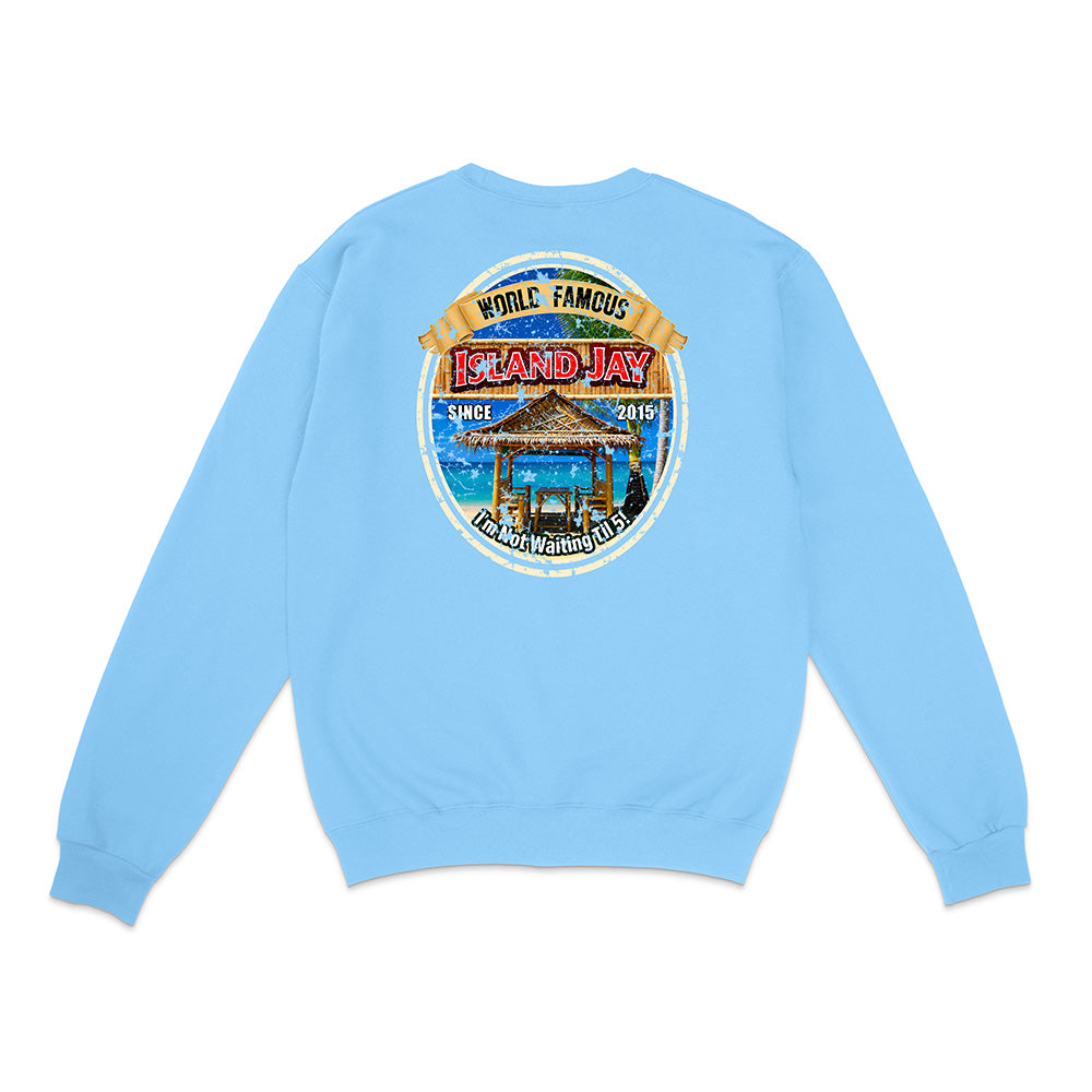 A light blue crewneck sweatshirt shown from the back, featuring a large circular graphic print on the center back with a beach cabana, palm trees, and the text 'Island Hay' and 'While Famous'.