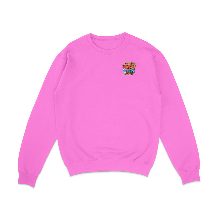 A bright pink crewneck sweatshirt with a small colorful graphic on the left chest, displayed on a clean white background.