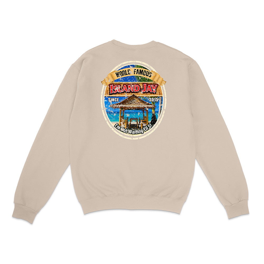 A light beige crewneck sweatshirt shown from the back, featuring a large circular graphic print on the upper back with a beach scene and the text 'WHILE FAMOUS Island Hay'.