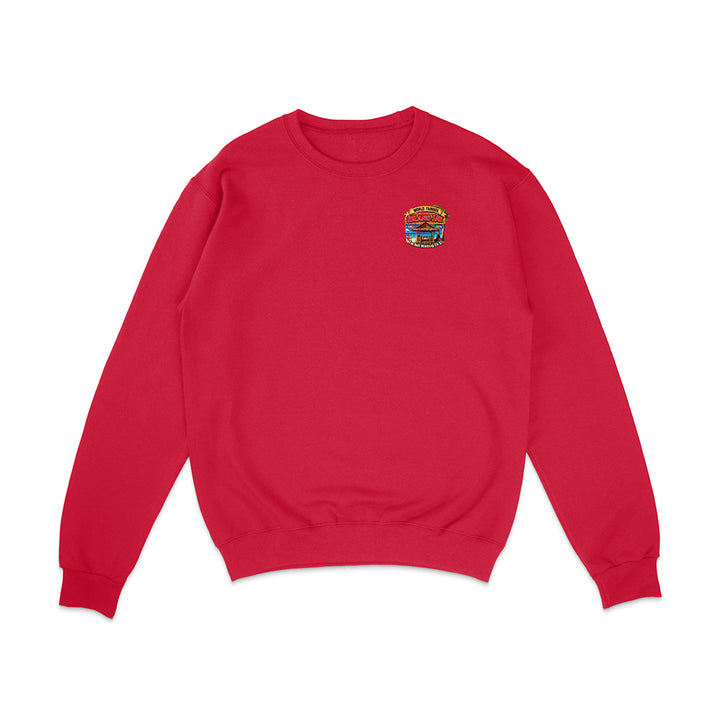 A red crewneck sweatshirt with a small colorful graphic on the left chest, displayed flat against a plain white background.