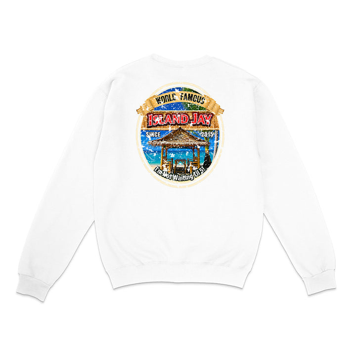 A white crewneck sweatshirt shown from the back, featuring a large circular graphic print on the upper back with a beach scene and the text 'While Famous Island Hay'.
