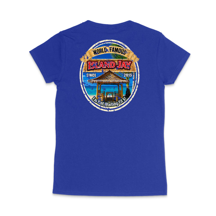 A royal blue short-sleeve t-shirt shown from the back, featuring a large circular graphic print on the upper back with the text 'World Famous Island Jay' and a beach cabana illustration.