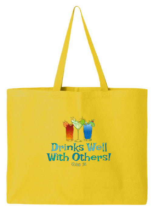 Yellow tote bag with drink graphics and text 'Drinks Well With Others!' on a white background