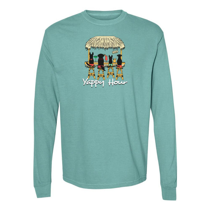 Teal long-sleeve shirt with a graphic of dogs at a tiki bar and 'Yappy Hour' text.