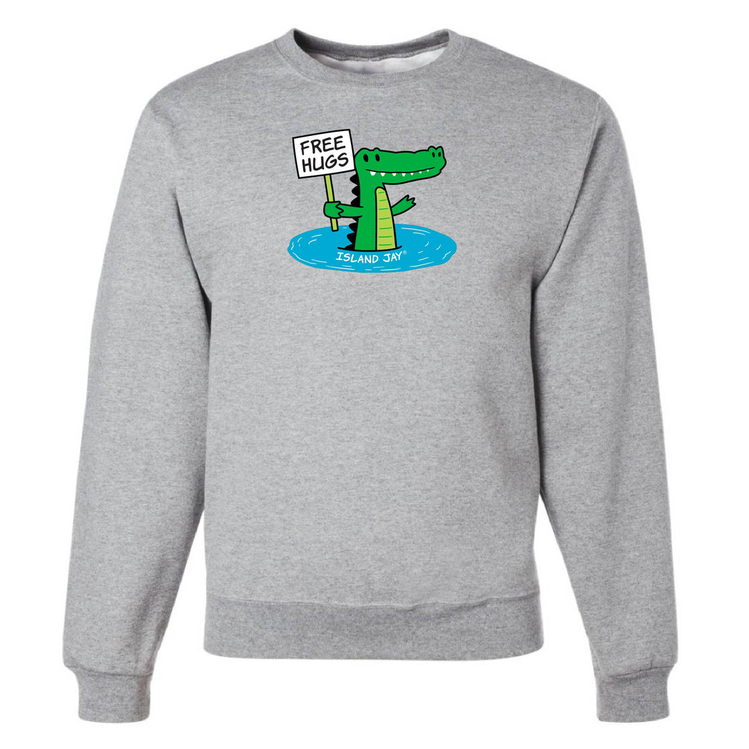 Gray sweatshirt with a cartoon alligator holding a 'Free Hugs' sign on a white background