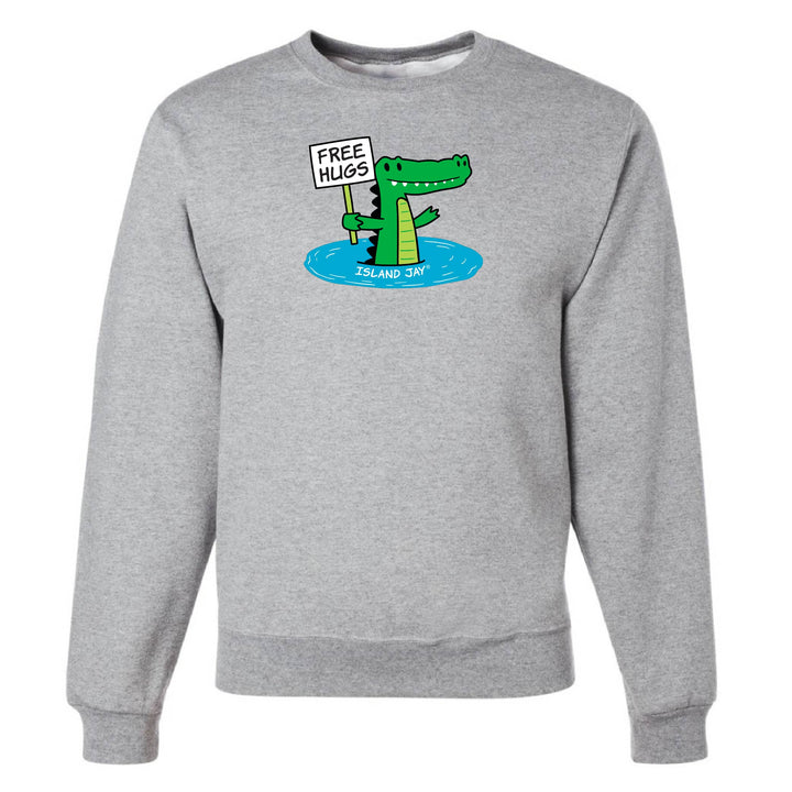 Gray sweatshirt with a cartoon alligator holding a 'Free Hugs' sign on a white background