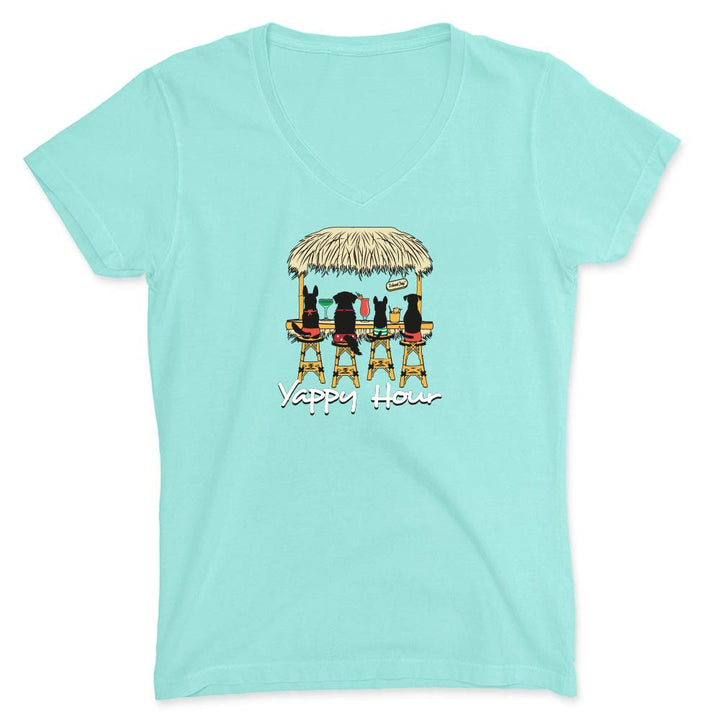 Mint green vneck t-shirt with a graphic of dogs at a tiki bar and 'Yappy Hour' text.