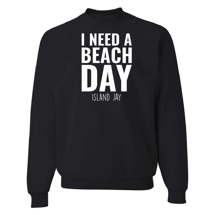 Black sweatshirt with 'I NEED A BEACH DAY' text on a white background