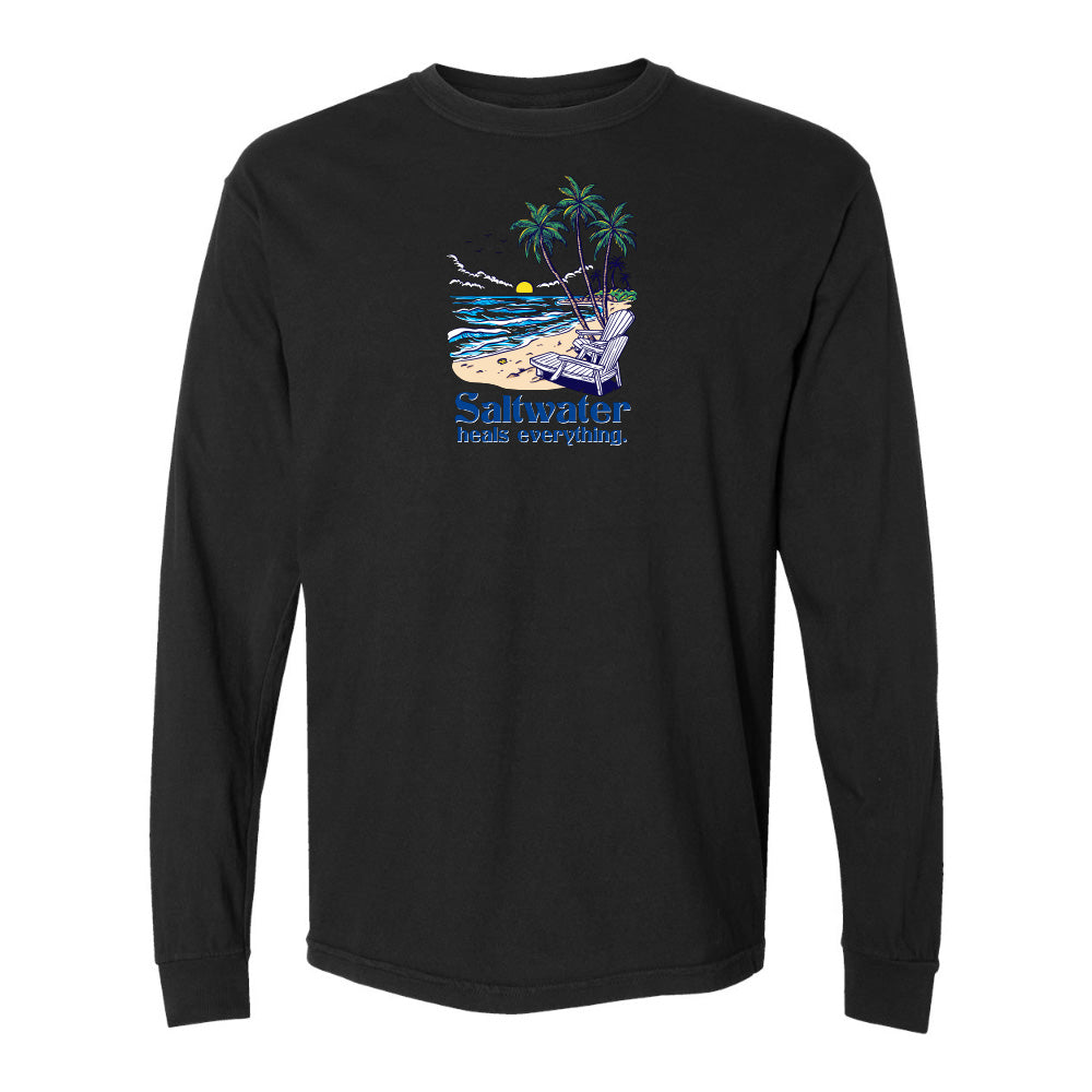 Black long-sleeve shirt with a beach graphic and 'Saltwater heals everything' text on a white background