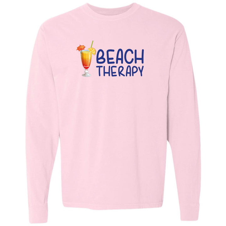 Pink sweatshirt with 'Beach Therapy' text and cocktail graphic on a white background