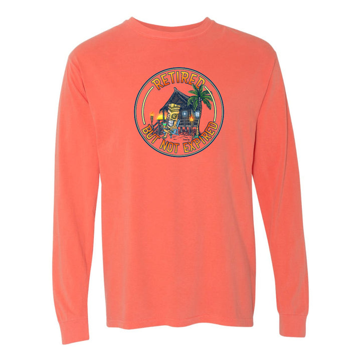 Coral long-sleeve shirt with a graphic design on a white background