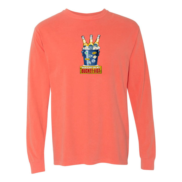 Coral long-sleeve shirt with a graphic design on a white background