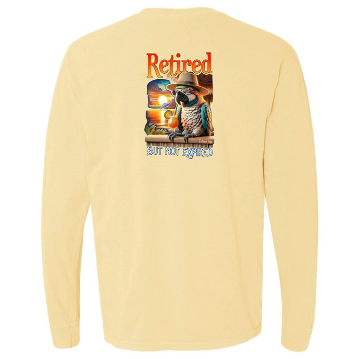 Yellow long-sleeve shirt with a parrot graphic and text on the back, on a white background.