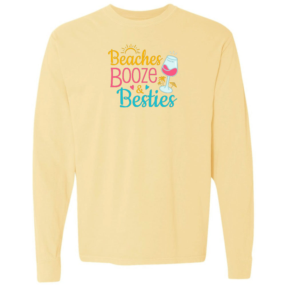 Yellow sweatshirt with 'Beaches Booze & Besties' text and wine glass graphic on a white background