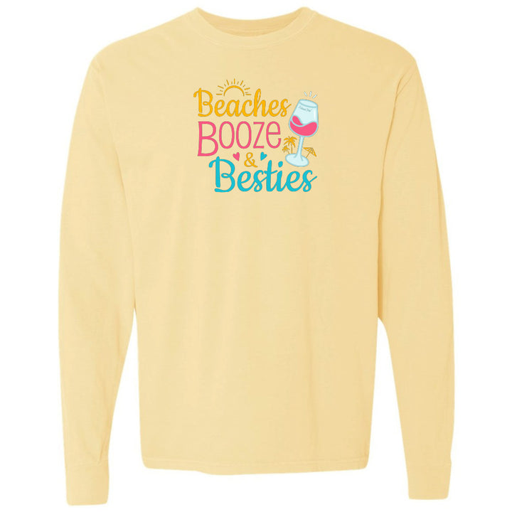 Yellow sweatshirt with 'Beaches Booze & Besties' text and wine glass graphic on a white background