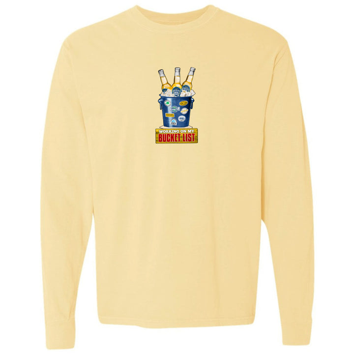 Yellow long-sleeve shirt with graphic design on a white background