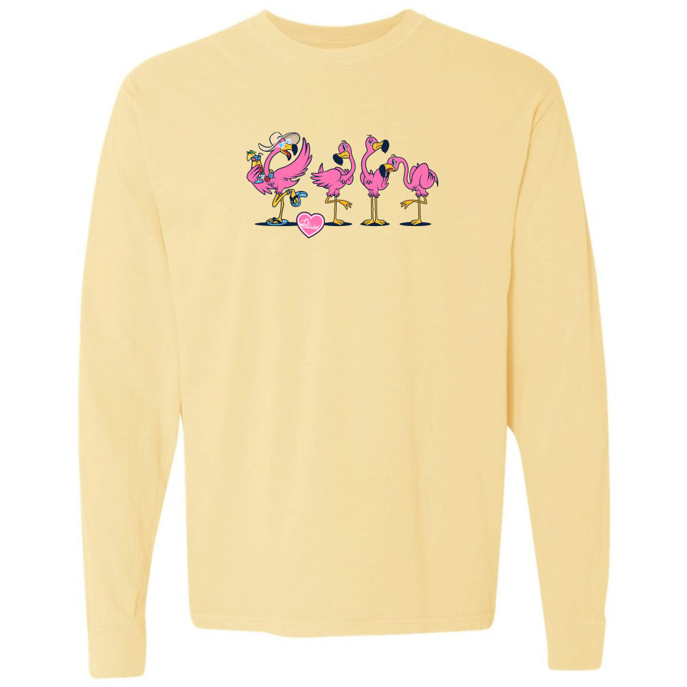 Yellow long-sleeve shirt with pink flamingo design on a white background
