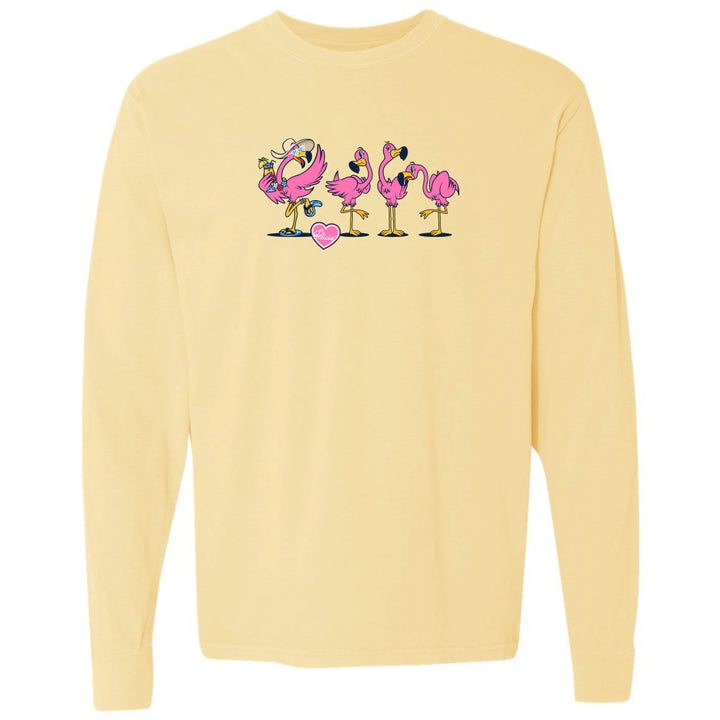 Yellow long-sleeve shirt with pink flamingo design on a white background