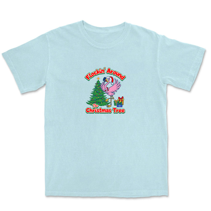 Light blue t-shirt with a Christmas-themed graphic and text on a white background