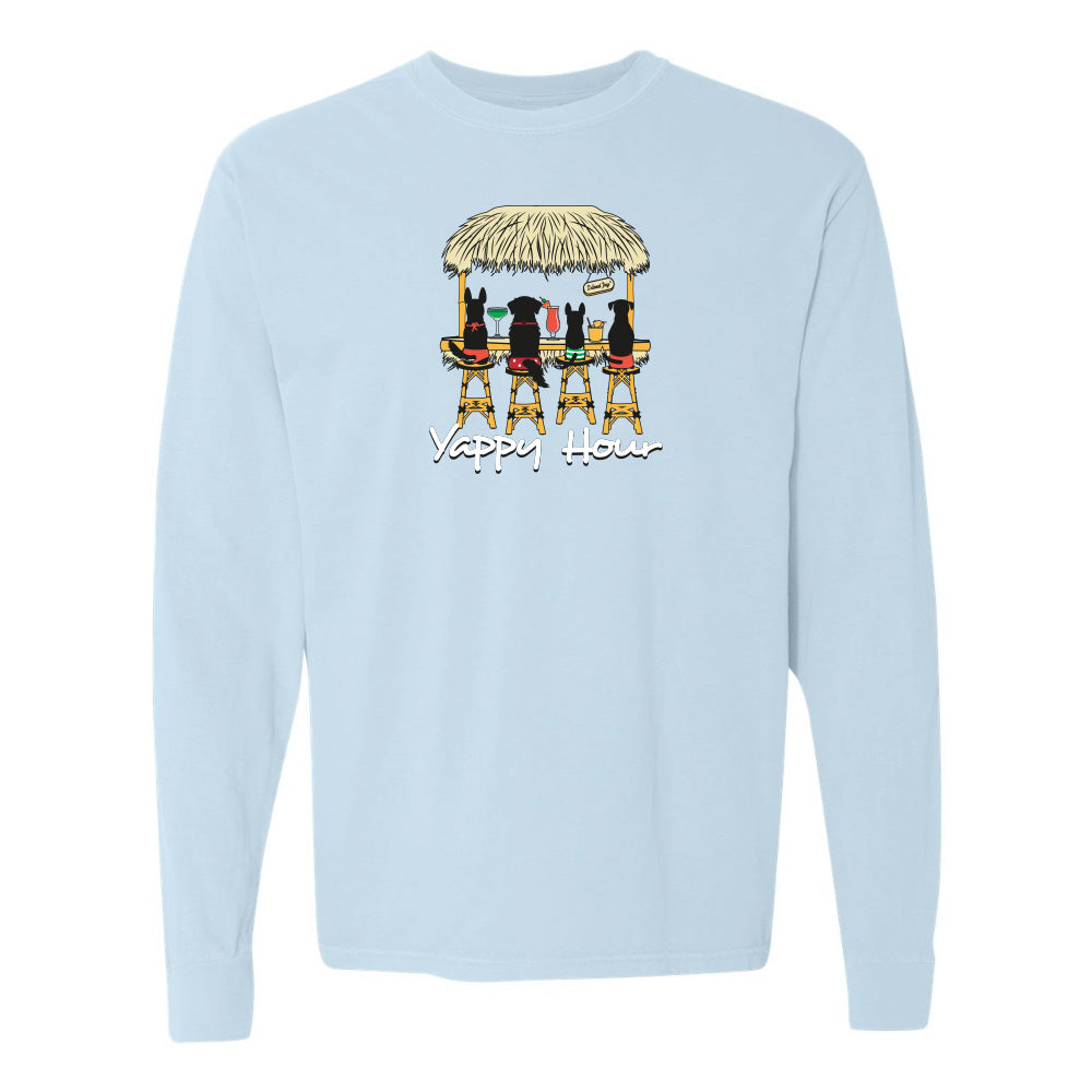 Light blue sweatshirt with a graphic of dogs at a beach hut and 'Yappy Hour' text on a white background.