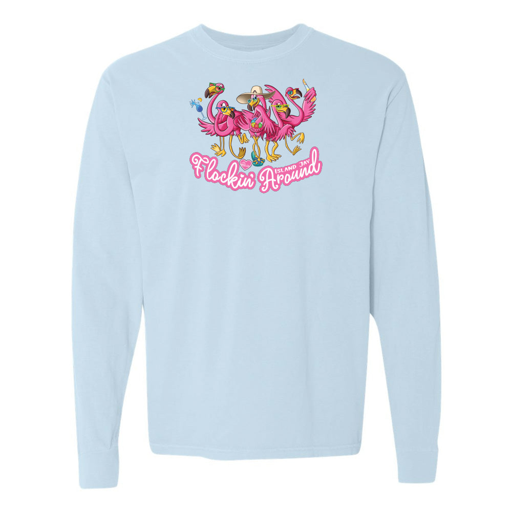 Light blue sweatshirt with flamingo design and text on a white background