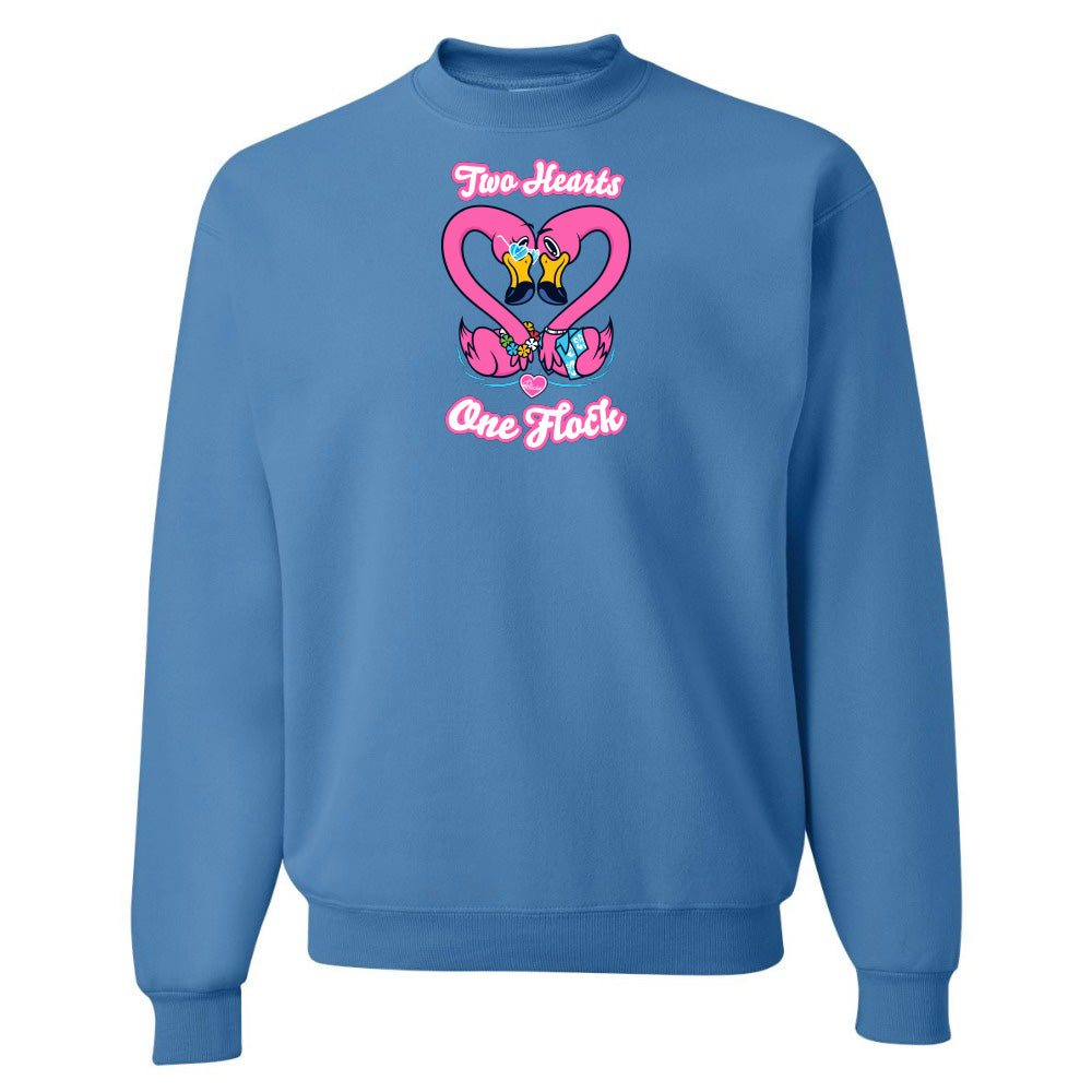 Blue sweatshirt with a heart design and text on a white background