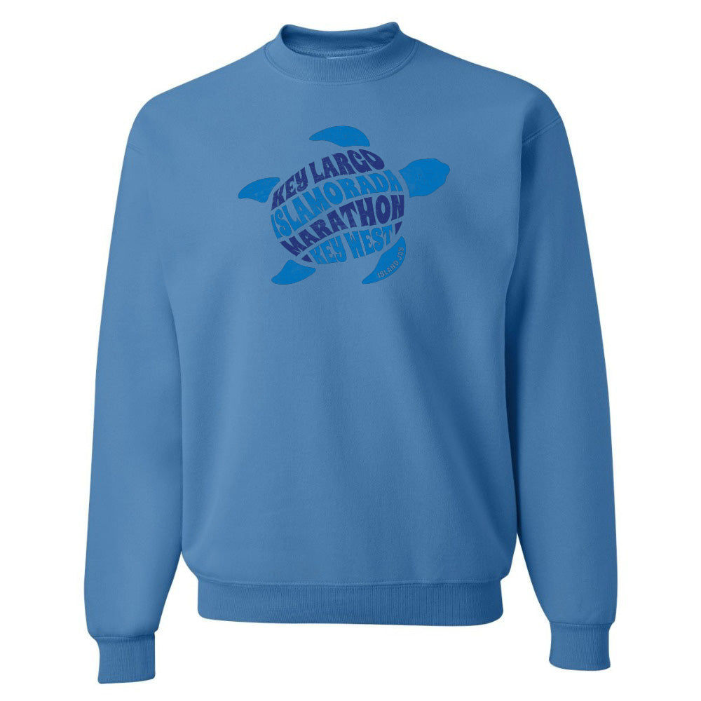 Blue sweatshirt with turtle design and text on a white background
